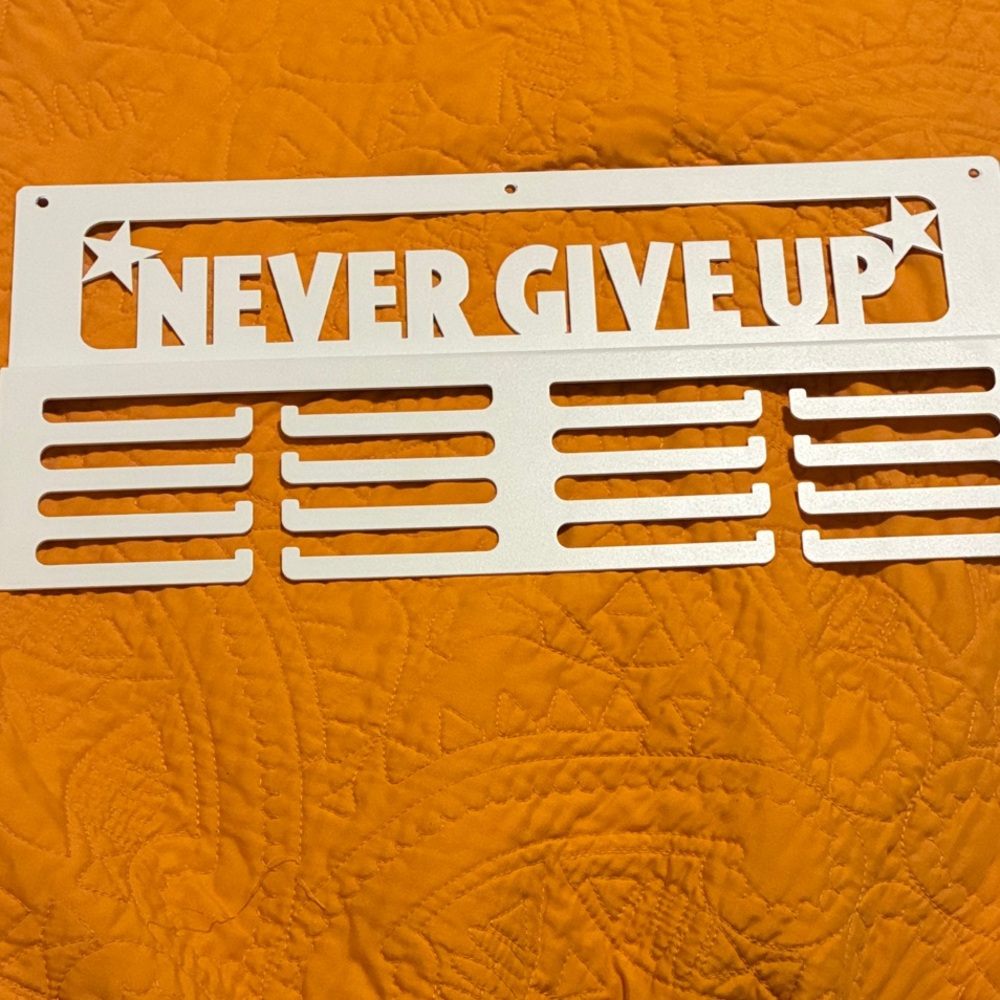 “Never Give Up “ Medal Holder